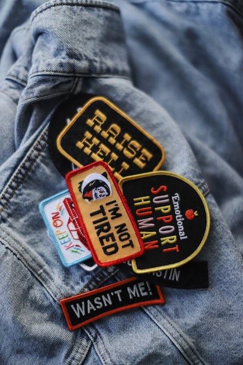 Denim jacket with embroidered patches