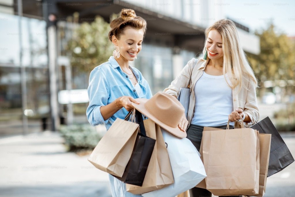 Friends shopping for clothes