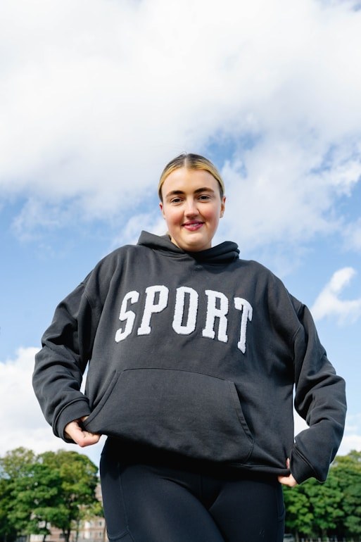 Woman in a sport hoodie