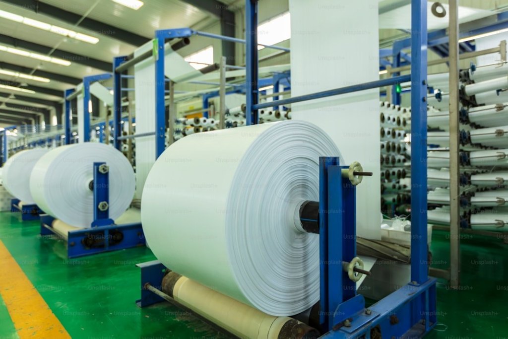 Fabric rolls on industrial machinery