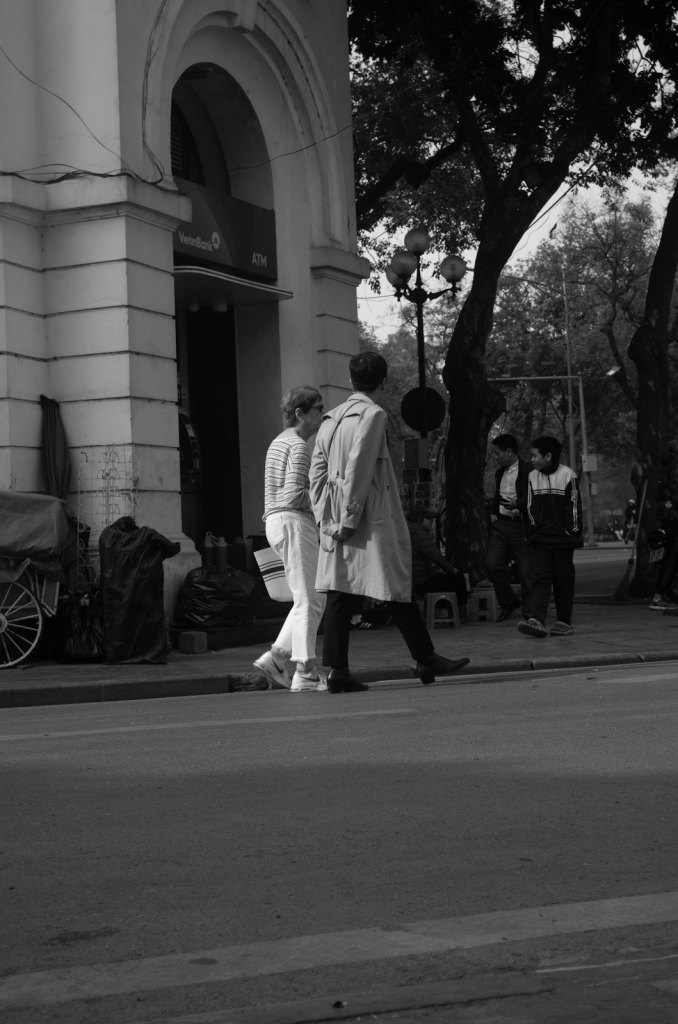 Black-and-white street scene in Hanoi